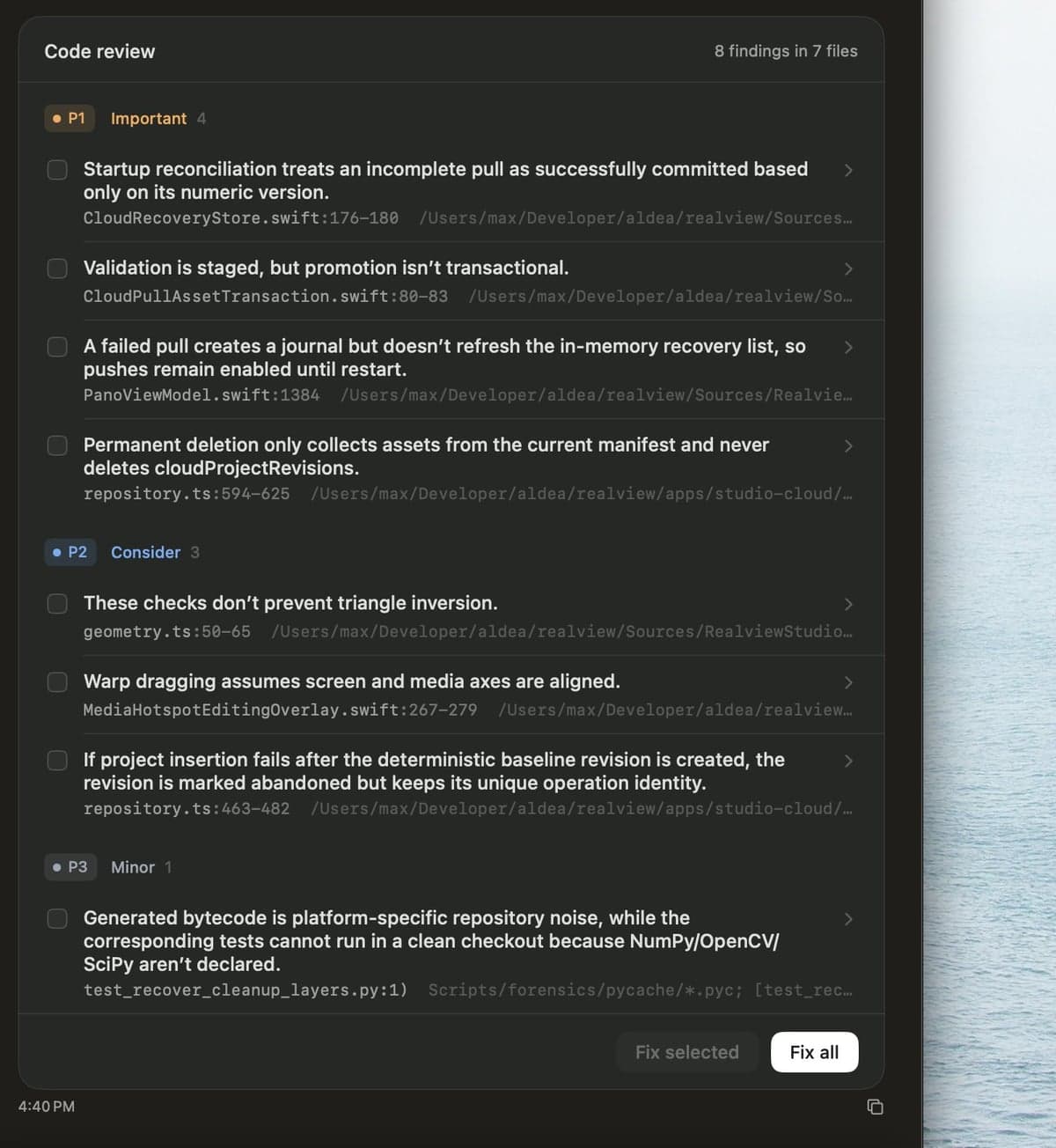 Code review card with findings organized by priority and Fix selected and Fix all actions
